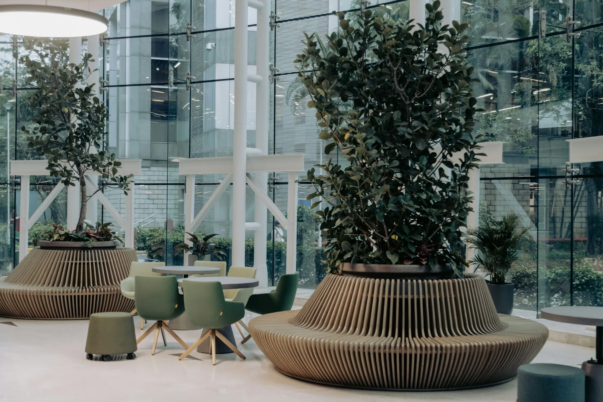 Atrium seating with large planters and glass walls